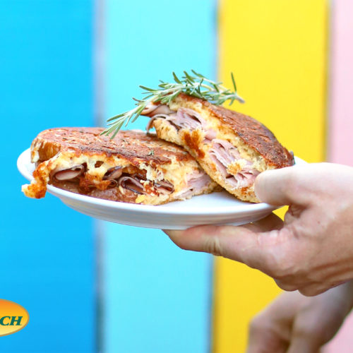 The Ultimate Grilled Cheese and Ham Sandwich with Savory Pickle and Cheese Spread