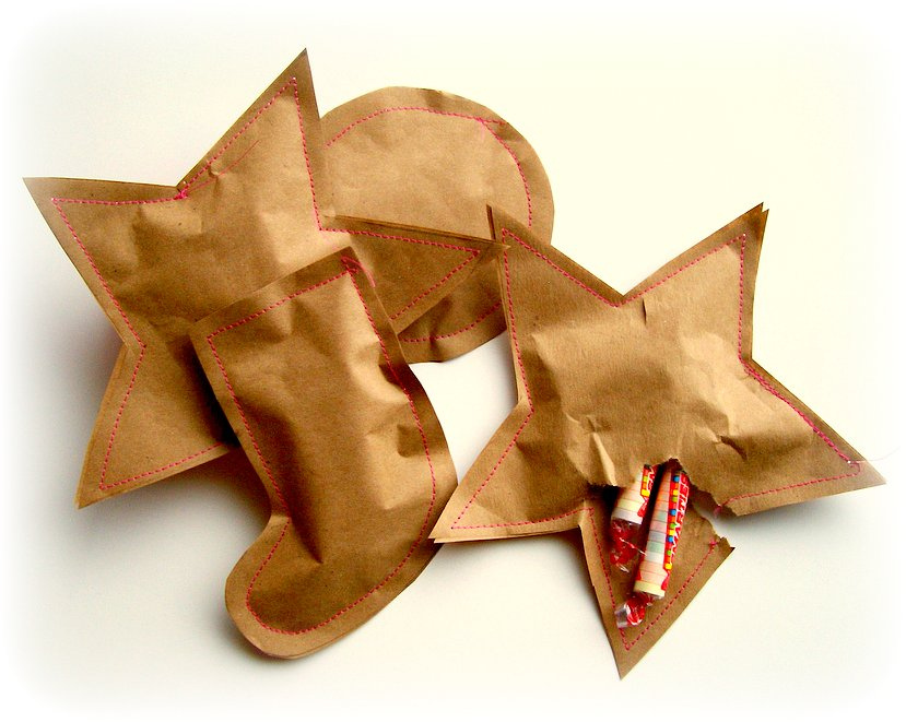 http://peppermintplum.blogspot.com/2010/12/sewn-paper-candy-pouch.html