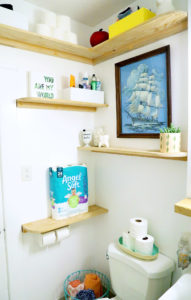 DIY Faux Floating Bathroom Shelves - corner view of shelves in bathroom.