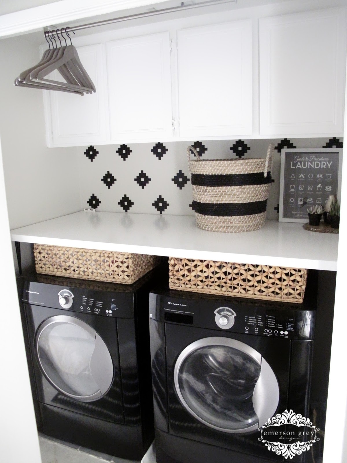 I love pretty much everything about this laundry room makeover. My favorite part is the space saver idea to have a spot to hang clothes right above the machines. Found on Emerson Grey Designs.