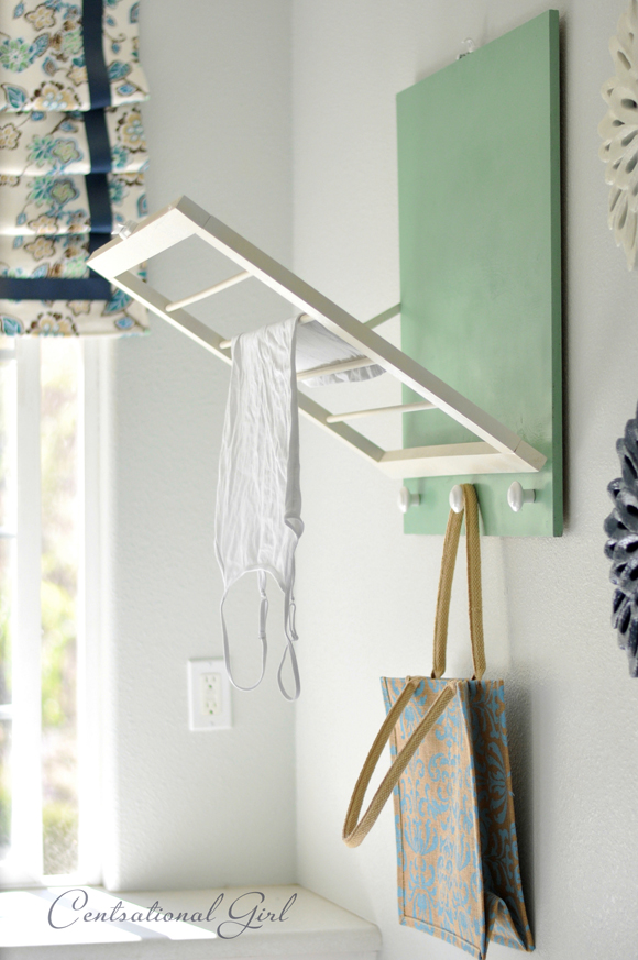 This is one of my favorite laundry room DIYs. We have no where to hang clothes to dry in our home, so this is perfect. It's folds up into the wall when you don't need it. Found on Centsational Girl.