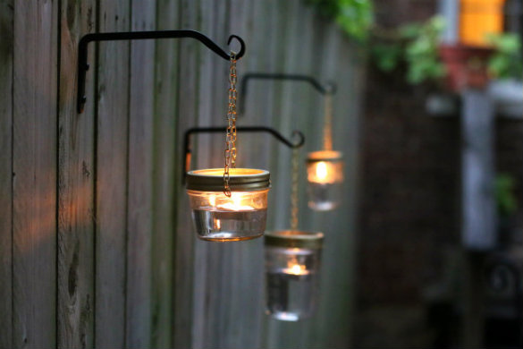 Hanging mason jar lantern lights, from 17 Apart.